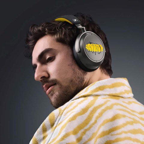 Sennheiser MOMENTUM 4 Wireless 80th Anniversary Edition Headphones - Yellow - lifestyle - man